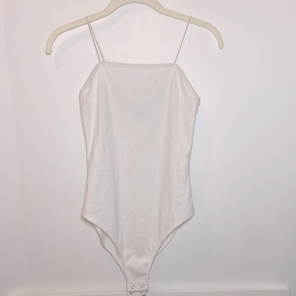White button body suit. Size:xs